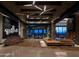 Spacious clubhouse lobby with seating and fireplace at 12387 E Black Rock Rd, Scottsdale, AZ 85255