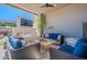 Relaxing outdoor patio with seating area and fireplace at 12387 E Black Rock Rd, Scottsdale, AZ 85255