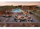 Resort-style pool with fire pit and seating area at 12387 E Black Rock Rd, Scottsdale, AZ 85255