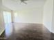 Living room with hardwood floors and large window at 1314 E Helena Dr, Phoenix, AZ 85022