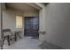 Front porch with seating and double doors at 1323 E Frances Ln, Gilbert, AZ 85295