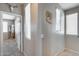 Upstairs hallway with neutral walls and carpet flooring at 1323 E Frances Ln, Gilbert, AZ 85295