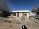 Ranch style home with front yard and chain link fence at 140 W 8Th Ave, Mesa, AZ 85210