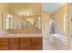 Spa-like bathroom with double vanity and a soaking tub at 15414 E Westridge Dr, Fountain Hills, AZ 85268