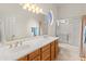 Bathroom boasts double sinks, a shower, and a bathtub at 15414 E Westridge Dr, Fountain Hills, AZ 85268