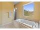 Relax in this bathroom with a soaking tub and mountain views at 15414 E Westridge Dr, Fountain Hills, AZ 85268