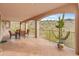 Covered patio with seating area and scenic mountain views at 15414 E Westridge Dr, Fountain Hills, AZ 85268