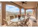 Large covered patio with table, chairs, and mountain views at 15414 E Westridge Dr, Fountain Hills, AZ 85268