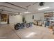 Garage with ample storage and space for a motorcycle at 15414 E Westridge Dr, Fountain Hills, AZ 85268