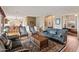 Living room with hardwood floors and access to kitchen at 15414 E Westridge Dr, Fountain Hills, AZ 85268