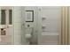 Clean bathroom with toilet, bathtub, and shower at 15759 W Superior Ave, Goodyear, AZ 85338