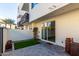 Small, private backyard with artificial turf and modern planters at 1717 E Morten Ave # 23, Phoenix, AZ 85020