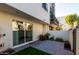 Private backyard patio with artificial turf and modern planters at 1717 E Morten Ave # 23, Phoenix, AZ 85020