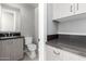 Contemporary bathroom boasts a gray vanity and toilet at 1717 E Morten Ave # 23, Phoenix, AZ 85020