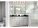 Double vanity bathroom with a large walk-in shower at 1717 E Morten Ave # 23, Phoenix, AZ 85020