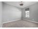 Bright bedroom with neutral walls and carpet flooring at 1717 E Morten Ave # 23, Phoenix, AZ 85020