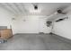 Spacious garage with overhead storage and epoxy flooring at 1717 E Morten Ave # 23, Phoenix, AZ 85020