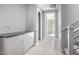 Bright hallway with tile flooring and built-in storage at 1717 E Morten Ave # 23, Phoenix, AZ 85020