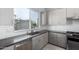 Modern kitchen with sink, appliances, and cabinetry at 1717 E Morten Ave # 23, Phoenix, AZ 85020