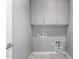 Laundry room with upper cabinets and hookups at 1717 E Morten Ave # 23, Phoenix, AZ 85020