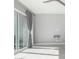 Open living area with large windows and grey walls at 1717 E Morten Ave # 23, Phoenix, AZ 85020