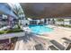 Relaxing community pool with shade structure and lounge chairs at 1717 E Morten Ave # 23, Phoenix, AZ 85020