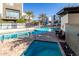 Community pool and spa with lounge chairs at 1717 E Morten Ave # 23, Phoenix, AZ 85020
