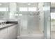 Walk-in shower with modern tile and glass enclosure at 1717 E Morten Ave # 23, Phoenix, AZ 85020