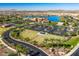 Community overview with lake and amenities at 17937 W Cedarwood Ln, Goodyear, AZ 85338