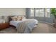 Spacious bedroom with a king-size bed and ample natural light at 17937 W Cedarwood Ln, Goodyear, AZ 85338