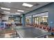 Community room with ping pong table, tables, and chairs at 17937 W Cedarwood Ln, Goodyear, AZ 85338