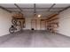 Attached garage with ample storage shelving and bike rack at 17937 W Cedarwood Ln, Goodyear, AZ 85338