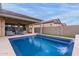 Stunning pool and spa with covered patio and spacious backyard at 17937 W Cedarwood Ln, Goodyear, AZ 85338
