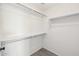 Spacious closet with double hanging rods and shelving at 19912 N Toledo Ave, Maricopa, AZ 85138