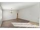 Bright dining room with hardwood floors and chandelier at 19912 N Toledo Ave, Maricopa, AZ 85138