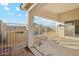 Covered patio with access to a fenced-in pool area at 19912 N Toledo Ave, Maricopa, AZ 85138