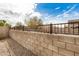 Private backyard with block wall and metal fencing for added security at 22378 N 184Th Ln, Surprise, AZ 85387