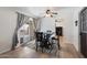 Bright dining area with table and chairs, near access to office and patio at 255 N Hunt E Dr, Mesa, AZ 85203