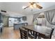 Kitchen dining area with a table for four and sliding door access to patio at 255 N Hunt E Dr, Mesa, AZ 85203