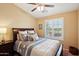 Bedroom with double bed and ceiling fan at 2725 E Mine Creek Rd # 1121, Phoenix, AZ 85024
