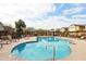 Inviting community pool with lounge chairs and shaded seating areas at 2725 E Mine Creek Rd # 1121, Phoenix, AZ 85024