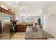 Open concept kitchen with an island and stainless steel appliances at 2725 E Mine Creek Rd # 1121, Phoenix, AZ 85024