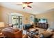 Bright and airy living room with a sliding glass door to backyard at 2725 E Mine Creek Rd # 1121, Phoenix, AZ 85024