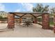 Relaxing poolside pavilion with stone pillars and picnic tables at 2725 E Mine Creek Rd # 1121, Phoenix, AZ 85024