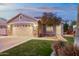 Charming house with landscaped lawn, two-car garage, and attractive stone accents at 2736 E Terrace Ave, Gilbert, AZ 85234