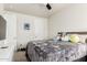 Bright bedroom with double bed, closet, and ceiling fan at 2821 S Skyline Dr # 165, Mesa, AZ 85212