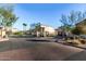 Gated entrance to community with landscaping at 2821 S Skyline Dr # 165, Mesa, AZ 85212