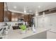Modern kitchen with dark cabinets and a breakfast bar at 2821 S Skyline Dr # 165, Mesa, AZ 85212