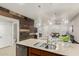 Modern kitchen with island and stainless steel appliances at 2821 S Skyline Dr # 165, Mesa, AZ 85212