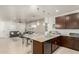 Open concept kitchen with island and living area view at 2821 S Skyline Dr # 165, Mesa, AZ 85212